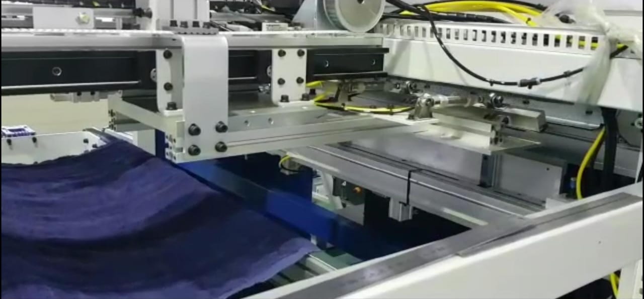 Precision guillotine cutting blade and pneumatic clamp on Bando cross cutter